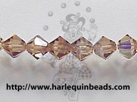 Image Swarovski Crystal Beads 4mm bicone 5328 light smoked topaz ab (brown) transparen